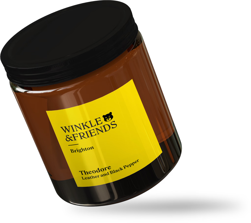candle jar with yellow Winkle & Friends logo